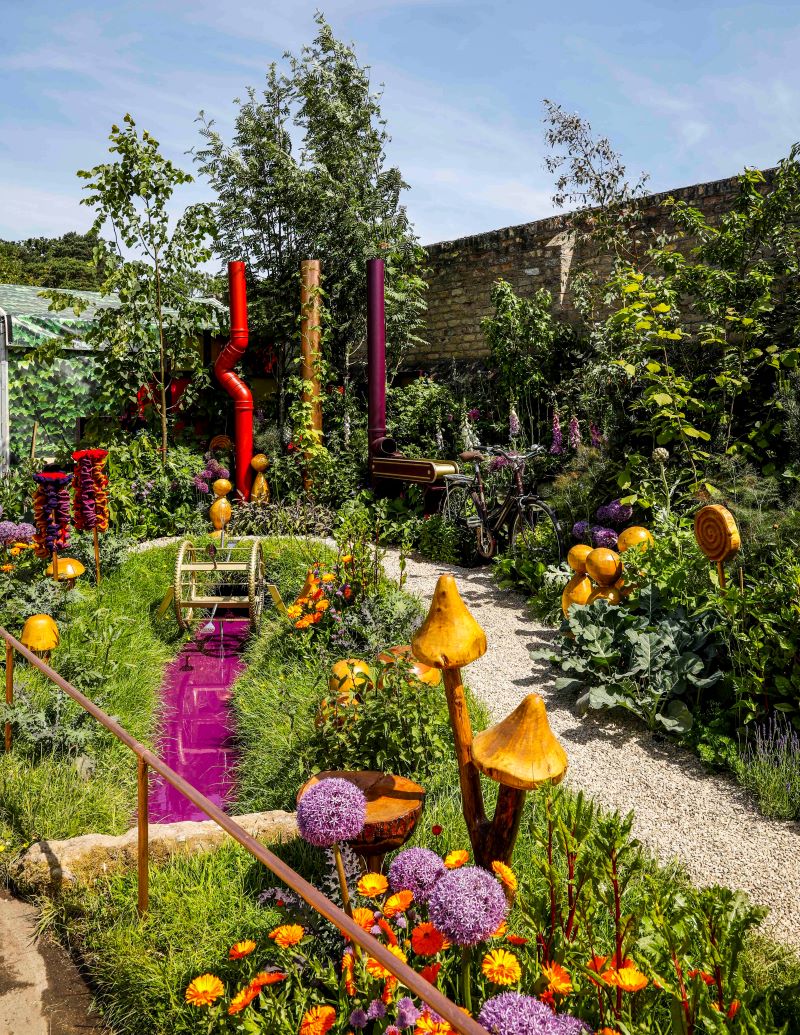 Bord Bia Bloom show garden with bright flowers in green garden